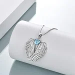 collier coeur bleu avec ailes