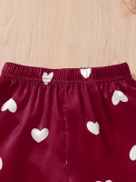 pyjama à motifs cœurs rouges