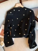 manteau court noir de tweed
