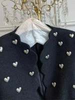 tweed noir veste coeur élevé